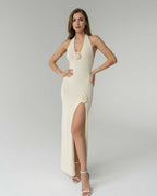 Sienna Maxi Dress - Cream Halter Maxi Dress with floral detail and high slit by Lauven, perfect for modern occasions.