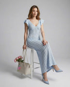 Sienna Maxi Dress from Lauven - Light blue lace dress with V-neck and ruffle sleeves, perfect for elegant occasions.