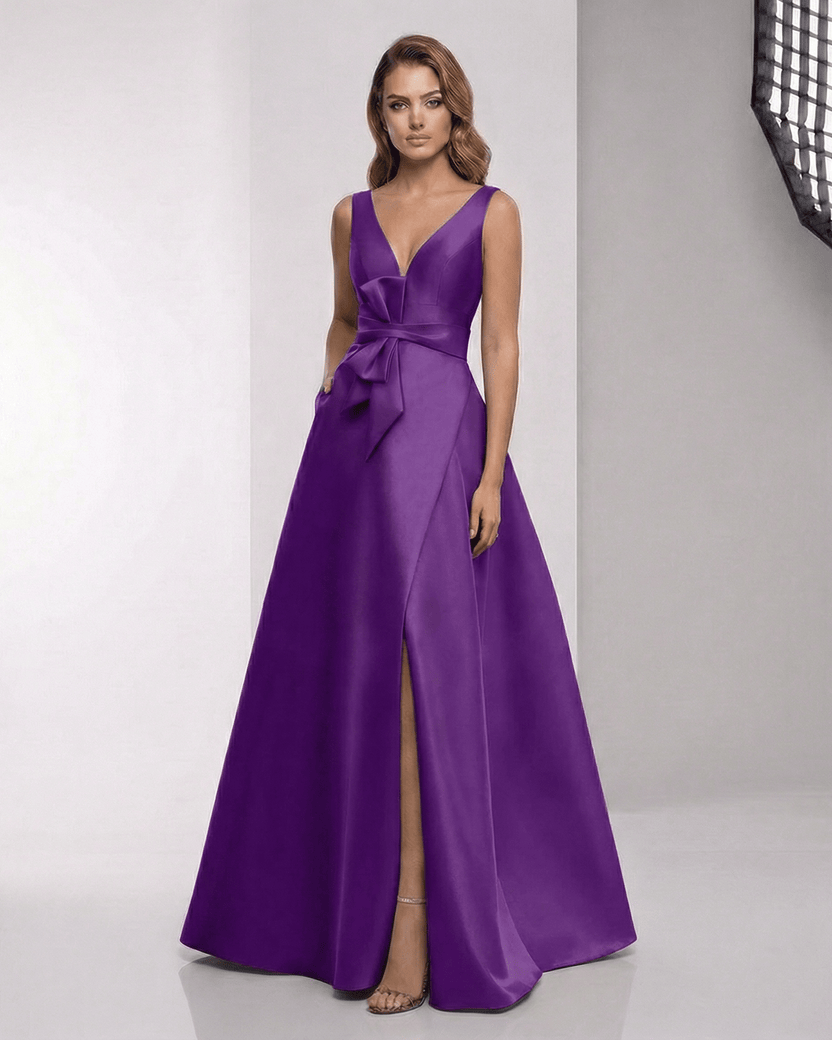 Sienna Maxi Dress in purple satin with wrap slit, bow waist, and elegant A-line silhouette by Lauven.