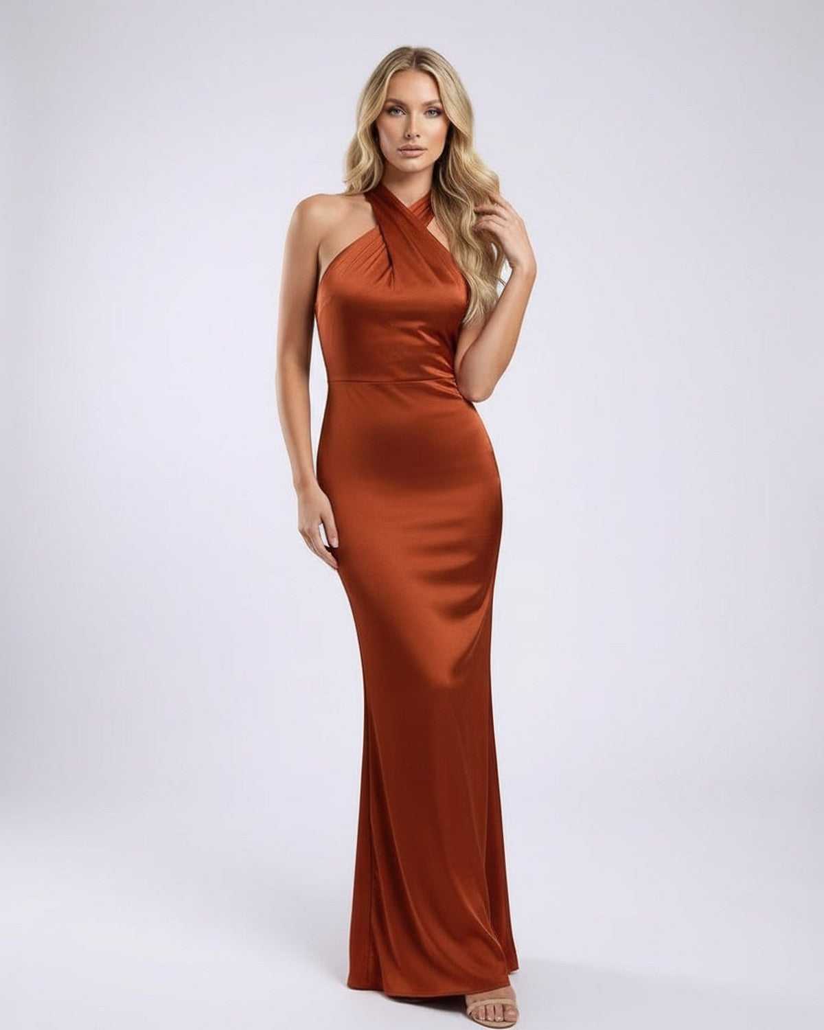 Sienna Maxi Dress in rust satin, featuring a halter neck and open back design, by Lauven for elegant occasionwear.