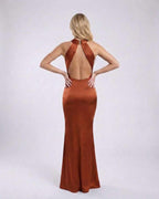 Sienna Maxi Dress - Rust satin halter neck dress with open back, showcasing elegance by Lauven for special occasions.