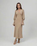 Sienna Midi Dress in beige with long sleeves, V-neckline, flattering silhouette, by Lauven.