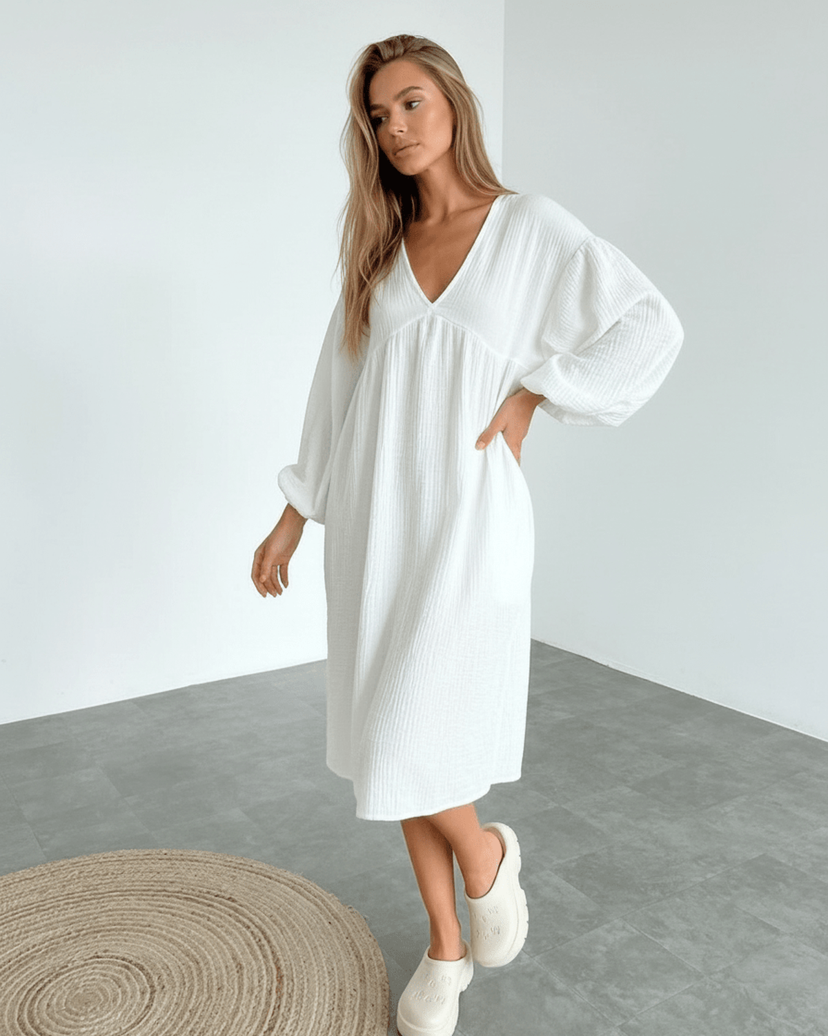 Sienna Midi Dress - Elegant white cotton midi dress with puff sleeves, embodying sophisticated comfort for warm-weather wardrobes.