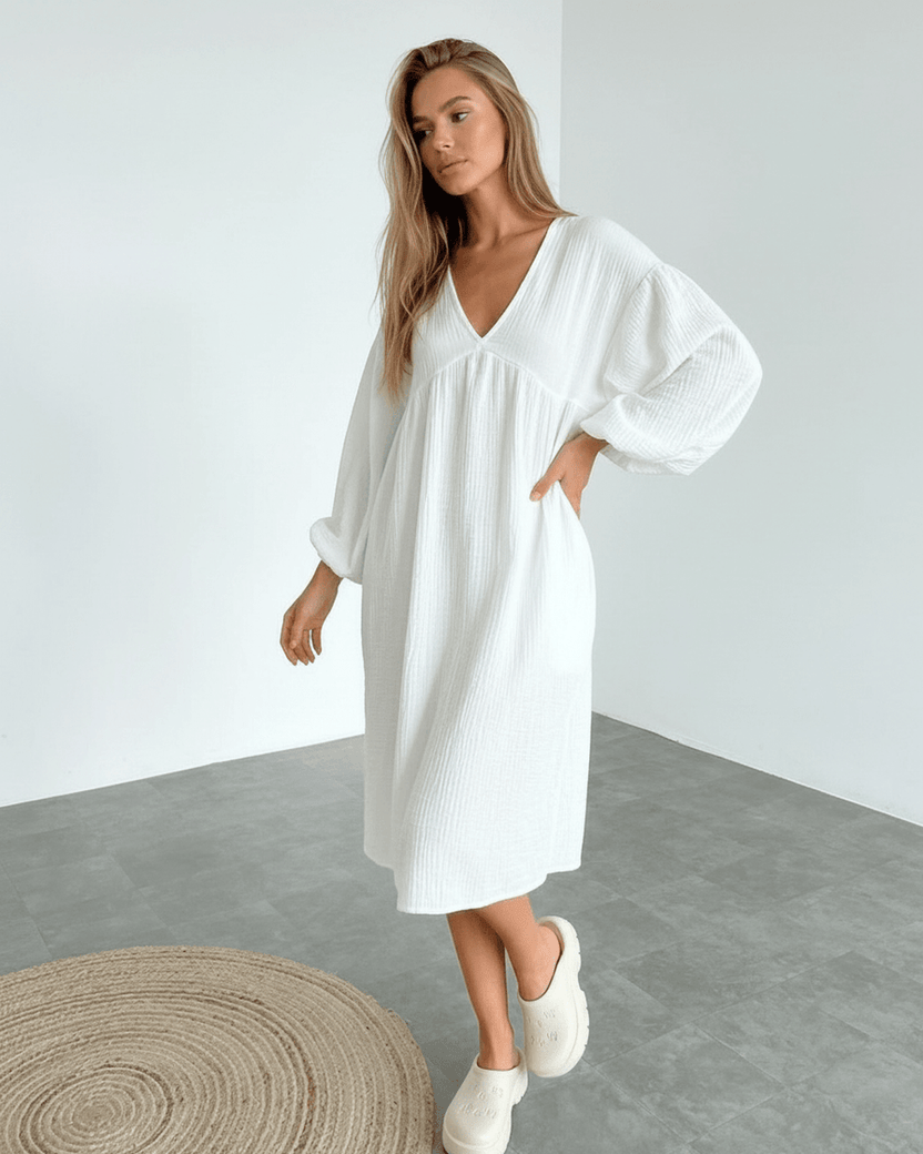 Sienna Midi Dress - Elegant white cotton midi dress with puff sleeves, embodying sophisticated comfort for warm-weather wardrobes.