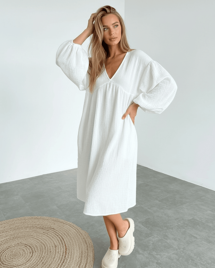Sienna Midi Dress featuring puff sleeves and breathable white cotton for everyday luxury by Lauven.