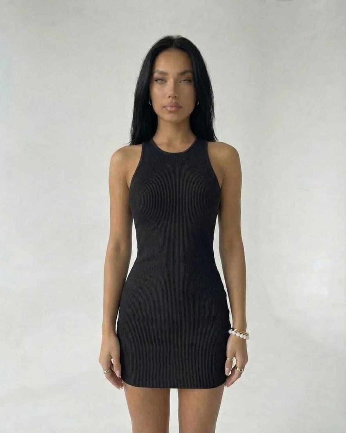 Sienna Mini Dress by Lauven, black ribbed knit sleeveless bodycon dress showcasing modern minimal style.