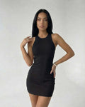 Sienna Mini Dress by Lauven in black ribbed knit, sleeveless bodycon style, showcasing a modern aesthetic.