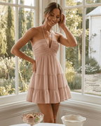 Sienna Mini Dress in blush pink, strapless with tiered ruffle skirt. Lightweight, breathable fabric by Lauven.