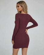Back view of a woman wearing the Sienna Mini Dress by Lauven in burgundy, showcasing its ribbed bodycon design.