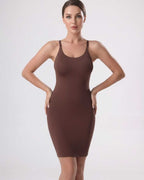Lauven Sienna Mini Dress showcasing a ribbed knit fabric, sleeveless square neckline, and stylish side slit for elegance.
