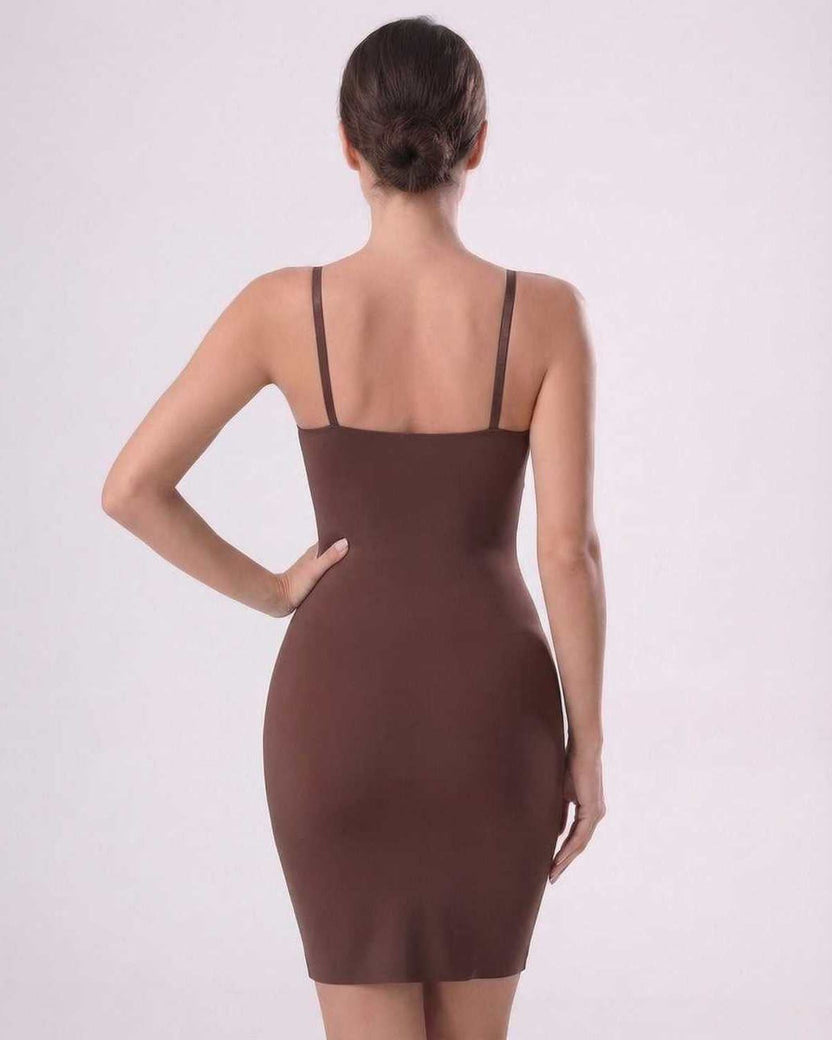 Sienna Mini Dress by Lauven, showcasing a sleek silhouette with ribbed knit and adjustable spaghetti straps.