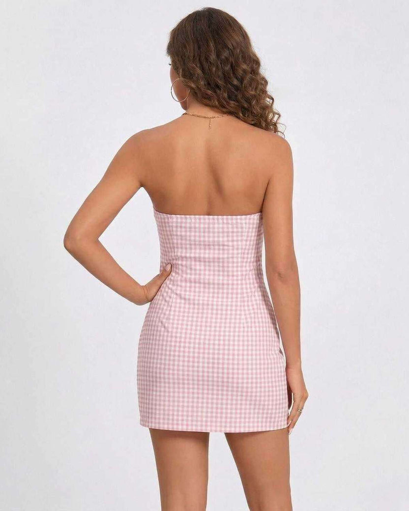 Back view of Sienna Mini Dress by Lauven, a strapless gingham summer dress in soft pink.