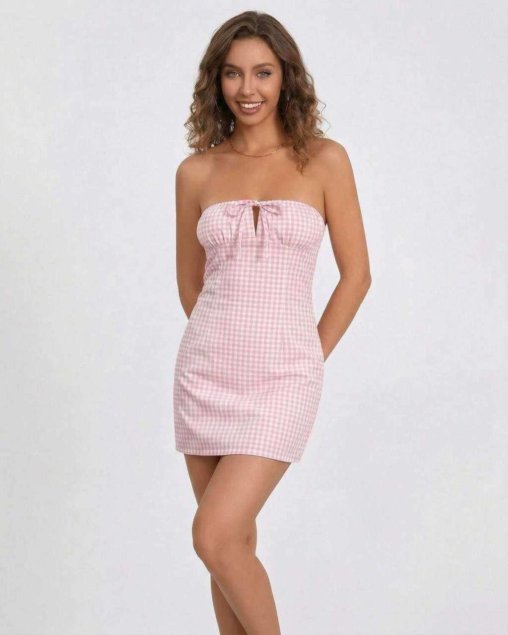 Sienna Mini Dress by Lauven – Strapless gingham mini dress with elegant silhouette in soft pink.