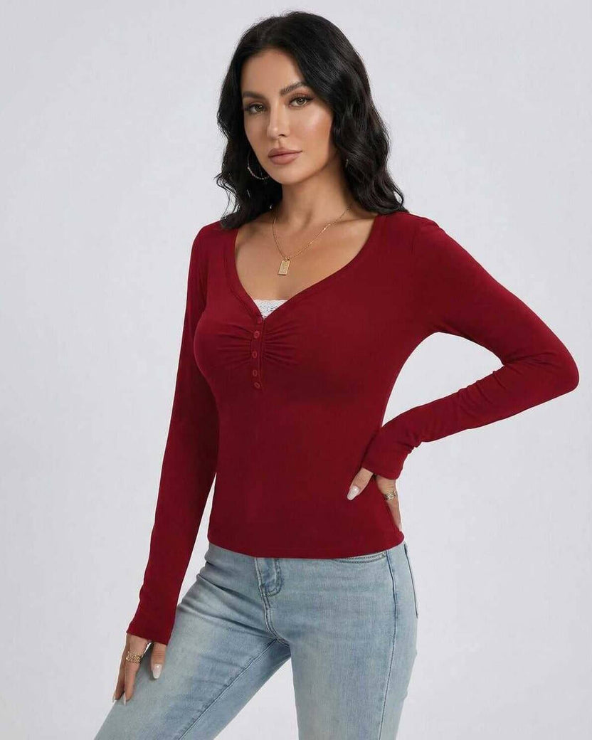 Sienna Pullover by Lauven, women’s slim fit V-neck long sleeve top with button detail in red.
