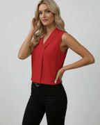 Sienna Top – Elegant sleeveless V-neck red top by Lauven, perfect for modern styling and day-to-evening transitions.