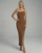 Elegant Sierra Midi Dress by Lauven in rich brown, featuring a knitted design with high slit for a flattering silhouette.
