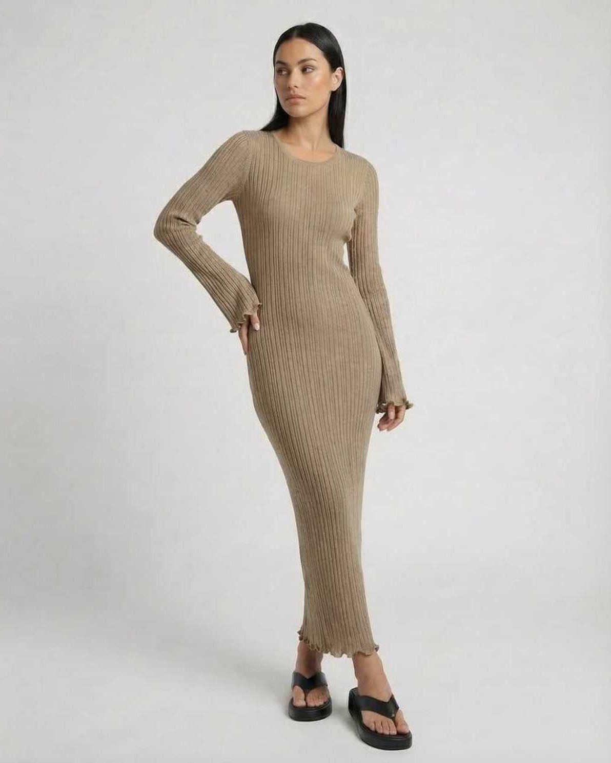 Lauven Solara Maxi Dress in warm taupe, ribbed knit with long flared sleeves and ruffled hem.