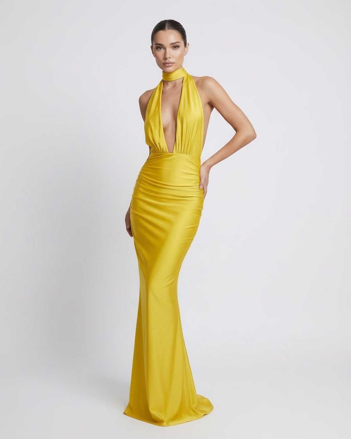 Solara Maxi Dress in vibrant yellow with deep plunge, high waist design, by Lauven, perfect for evening and formal occasions.
