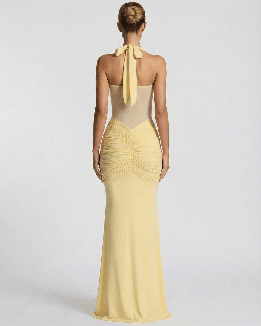 Solara Maxi Dress - elegant yellow halter dress with mesh panel and mermaid silhouette by Lauven.
