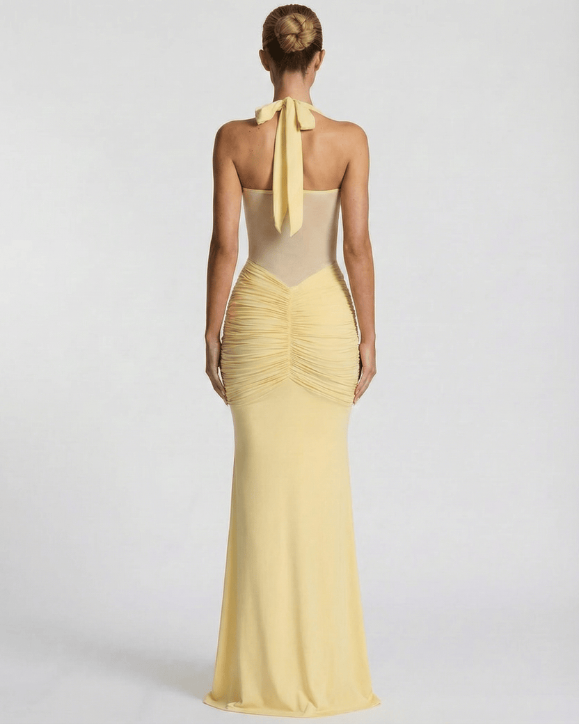 Solara Maxi Dress - elegant yellow halter dress with mesh panel and mermaid silhouette by Lauven.