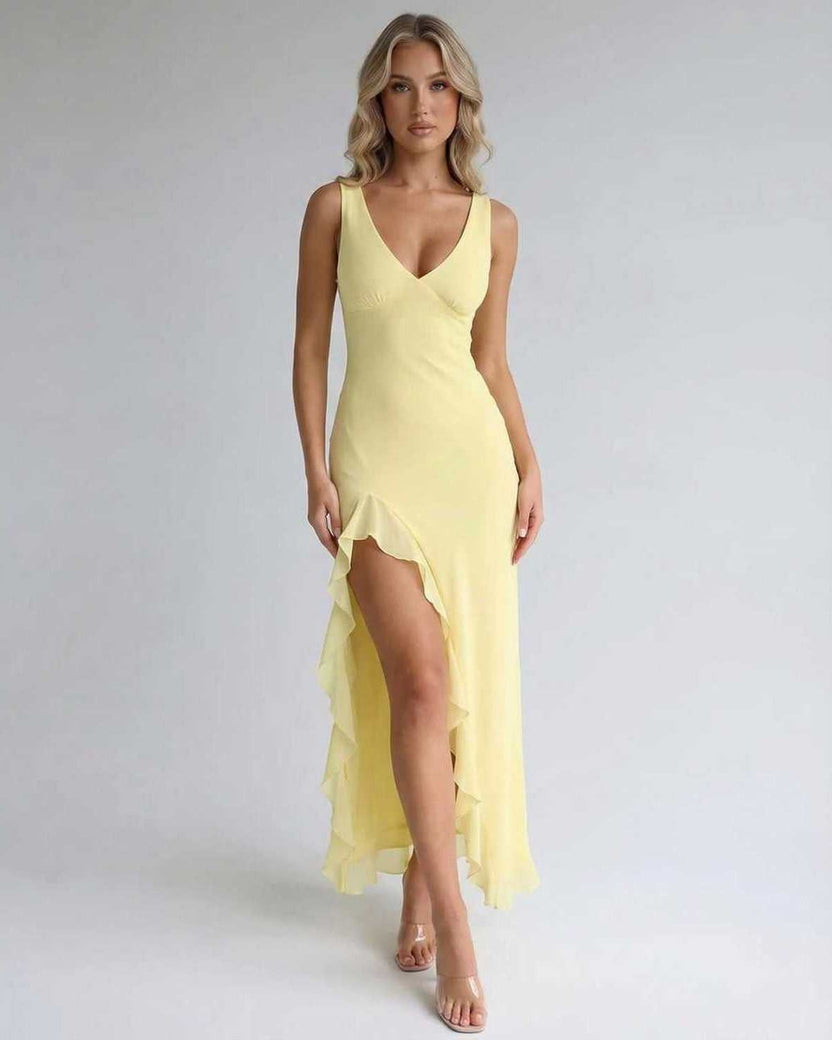 Solara Maxi Dress – Yellow dress with ruffle slit, flowing silhouette by Lauven for an elegant look.