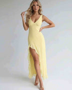 Solara Maxi Dress in yellow, featuring ruffle slit and flowing silhouette for a refined, modern aesthetic by Lauven.