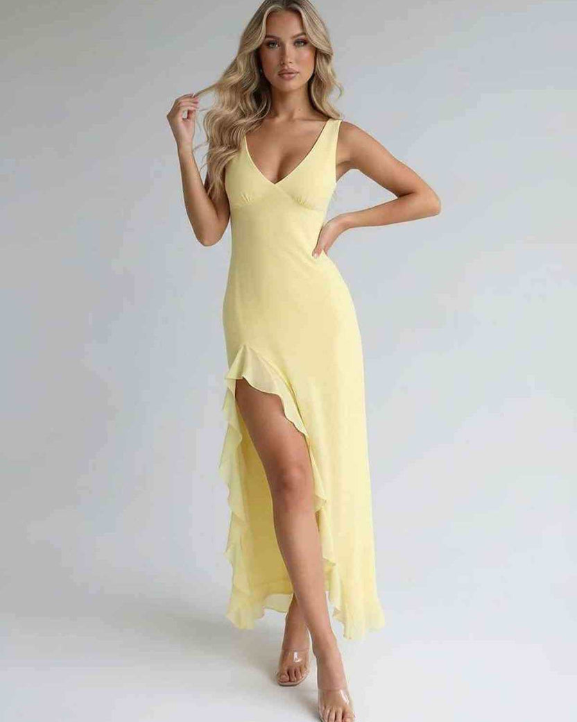 Solara Maxi Dress in yellow, featuring ruffle slit and flowing silhouette for a refined, modern aesthetic by Lauven.