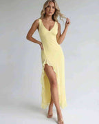 Solara Maxi Dress - Yellow maxi dress with ruffle slit, flowing silhouette, by Lauven, elegant summer & formal feel.