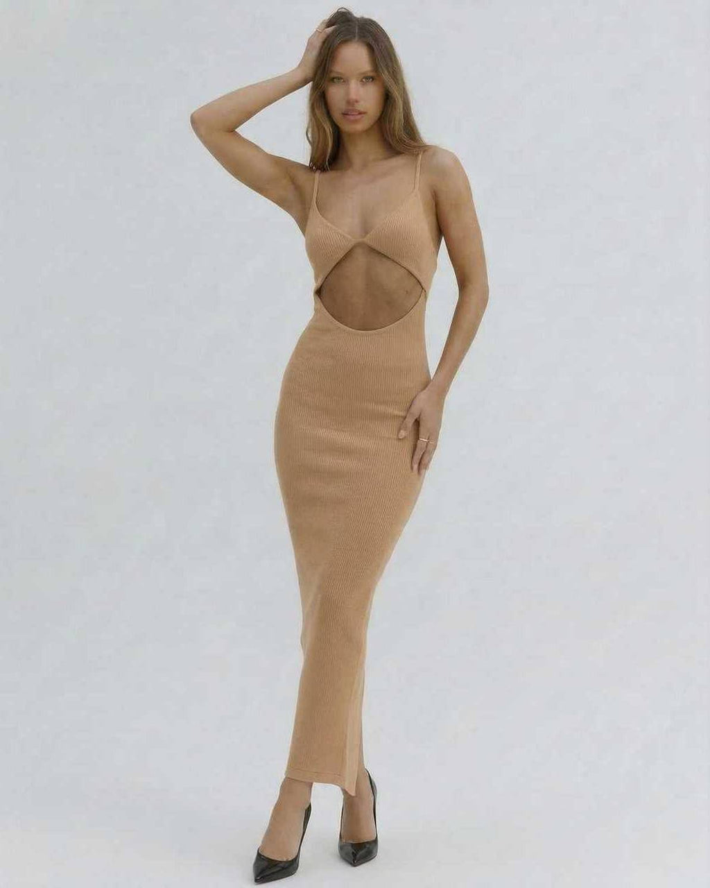 Solara Midi Dress by Lauven – Elegant nude cut-out spaghetti strap dress emphasizing a sophisticated silhouette.