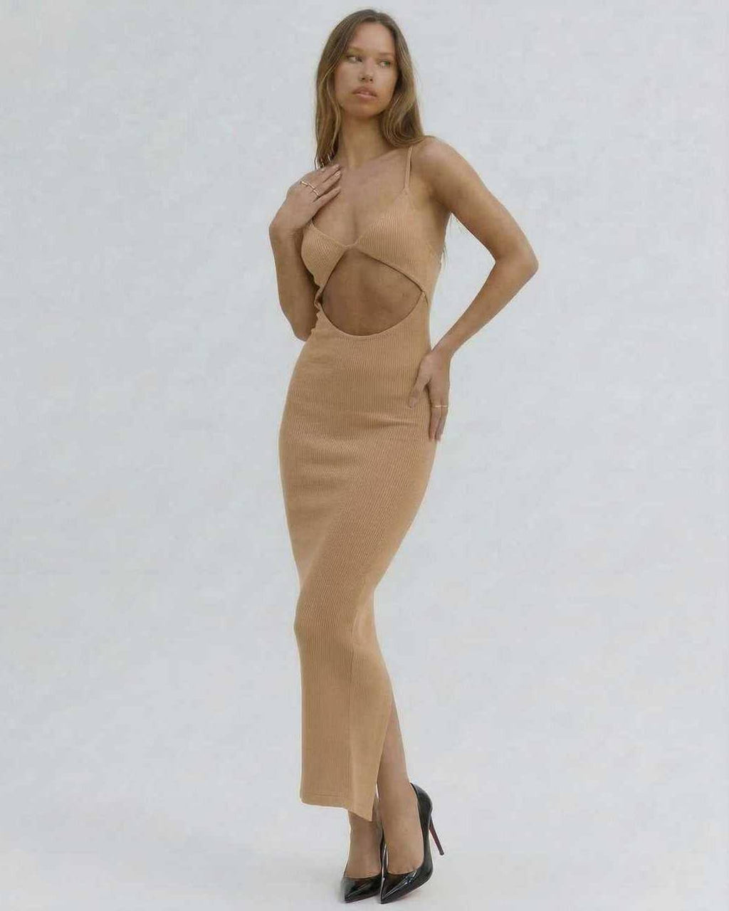 Solara Midi Dress by Lauven - Elegant cut-out spaghetti strap dress in nude on model, showcasing flattering slim fit.