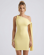 Solara Mini Dress: Yellow one shoulder bodycon dress by Lauven, featuring asymmetric neckline and sleek fit.