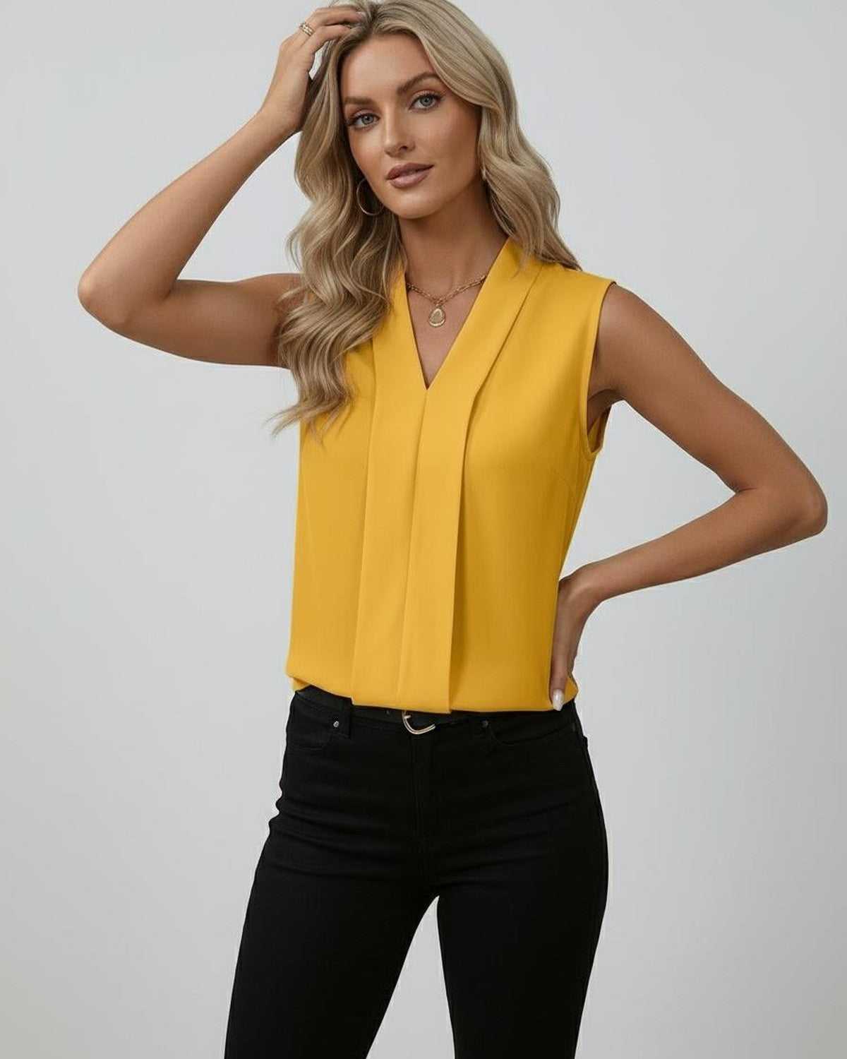 Solara Top – Elegant sleeveless V-neck yellow top by Lauven, radiating style and charm for any occasion.