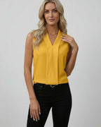 Solara Top - Elegant sleeveless V-neck yellow top by Lauven, perfect for modern dressing and flattering neckline.