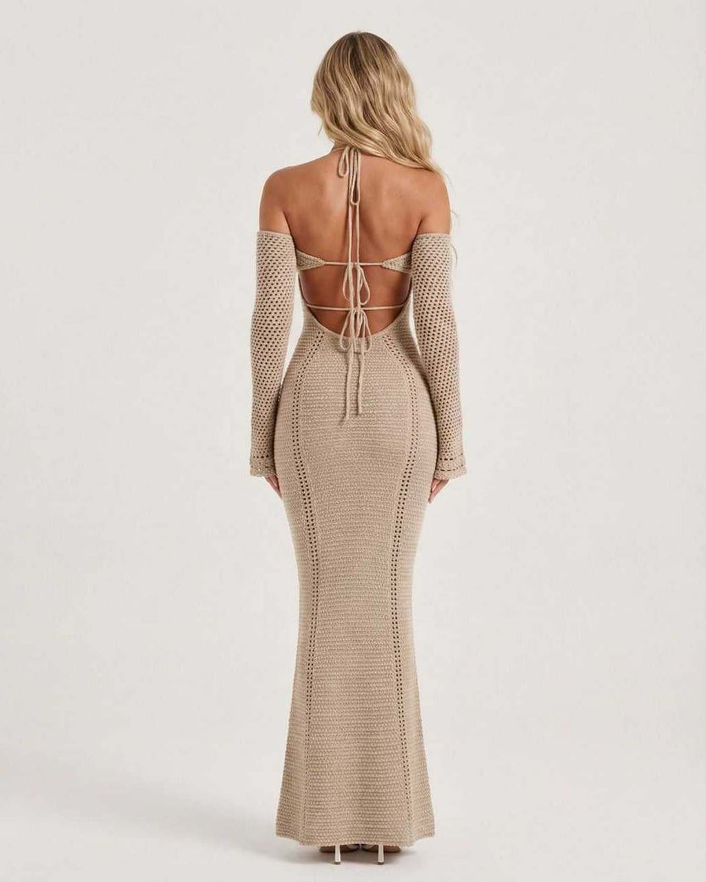 Soleil Maxi Dress back view featuring textured knit, open back detail, and long sleeves from Lauven.