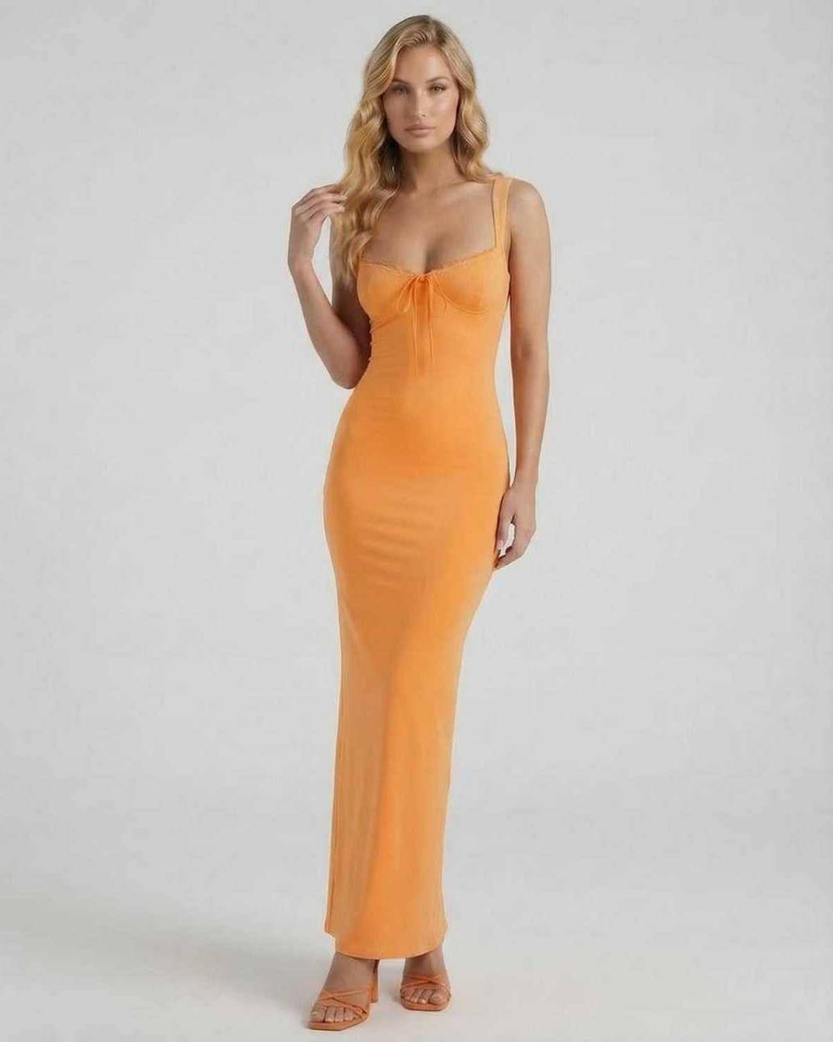 Soleil Maxi Dress in vibrant orange, featuring a slim fit, lace trim, and spaghetti straps by Lauven.