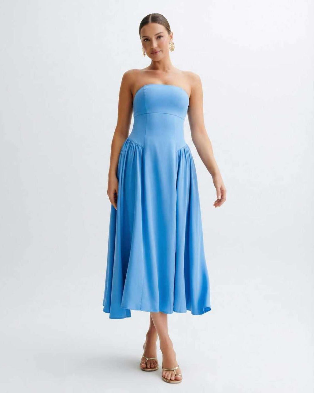 Soleil Midi Dress - Light blue strapless midi dress with pleated skirt by Lauven, offering a modern, feminine silhouette.