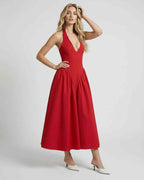 Soleil Midi Dress featuring a halter neck and backless design, perfect for special occasions by Lauven.
