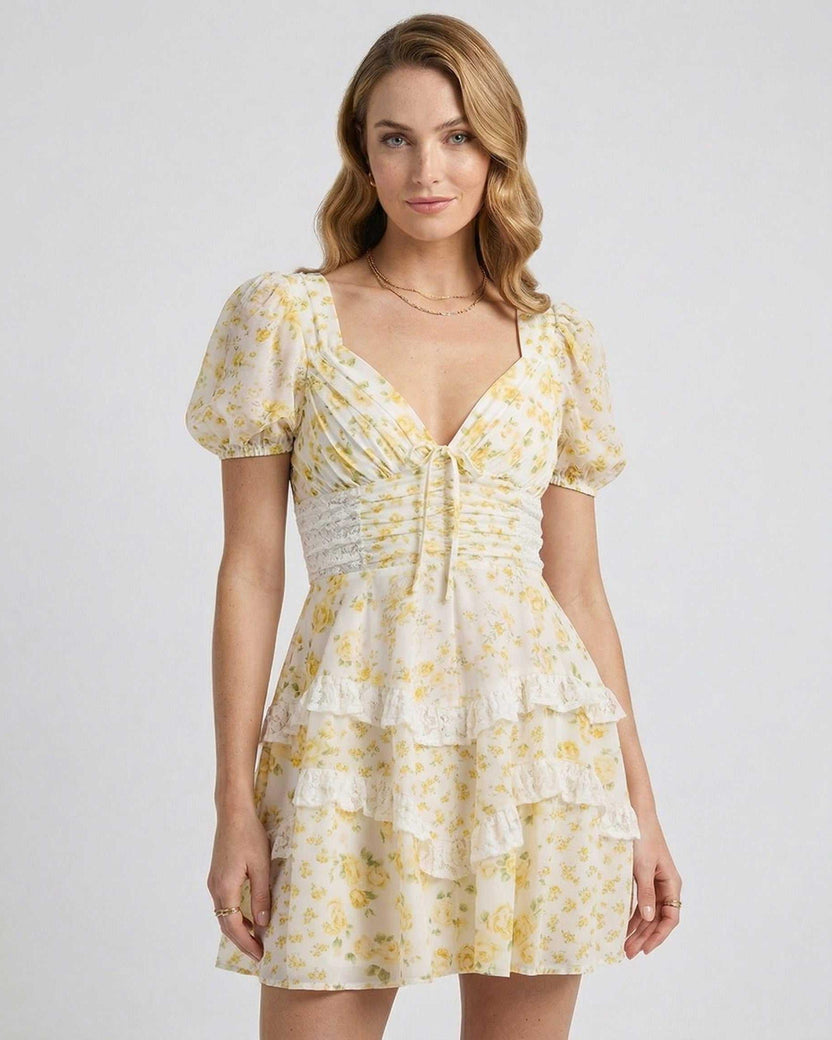 Soleil Mini Dress by Lauven featuring soft floral print, tiered ruffles, and elegant A-line silhouette for a romantic charm.