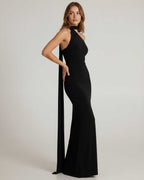 Solene Maxi Dress featuring a halter neck, draped sash, and sleek silhouette by Lauven, perfect for formal occasions.