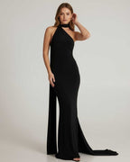 Solene Maxi Dress in black with halter neck and draped sash, designed by Lauven, offers elegance and sophistication.