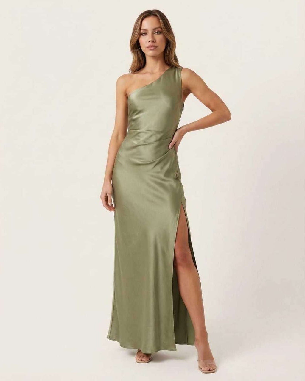 Solene Maxi Dress in refined sage green satin, featuring a one-shoulder neckline, side slit, and elegance by Lauven.
