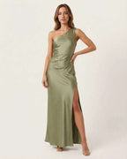 Solene Maxi Dress in refined sage green satin, featuring a one-shoulder neckline, side slit, and elegance by Lauven.