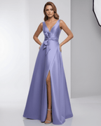 Solenne Maxi Dress in lavender satin, featuring a V-neck, A-line shape, bow accent, and elegant slit by Lauven.