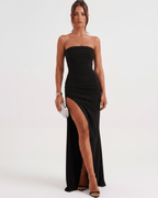 Solenne Maxi Dress by Lauven, featuring a bandeau design, side slit, and smooth polyester for an elegant look.