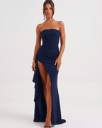 Solenne Maxi Dress by Lauven, featuring a strapless design, side slit, and elegant drape.