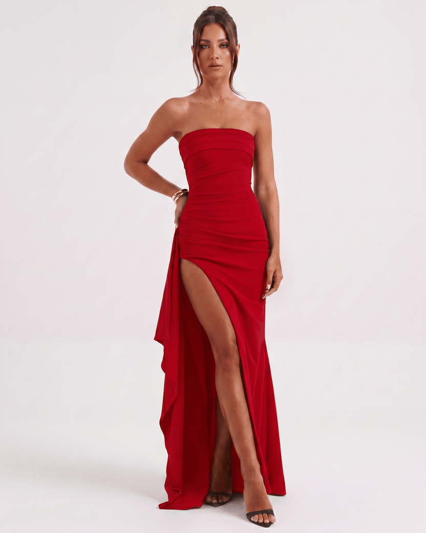 Solenne Maxi Dress by Lauven, red bandeau dress with dramatic side slit and flowing design.