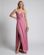 Lauven Sorrento Maxi Dress in pink, featuring a satin slip design and high slit for an elegant evening look.