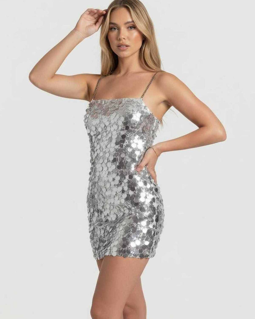 Sterling Mini Dress | Silver sequin bodycon silhouette with chain straps from Lauven for a radiant evening look.