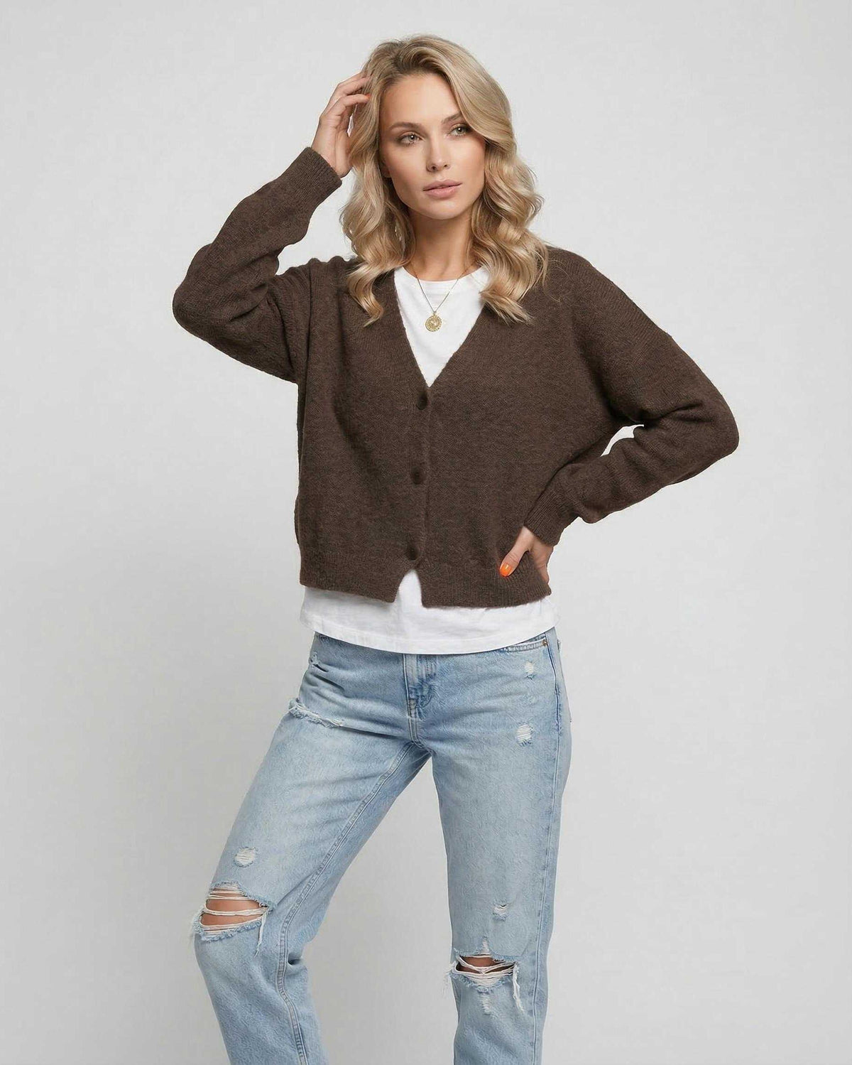 Terra Cardigan by Lauven – Stylish brown knit cardigan paired with casual outfit for everyday elegance.