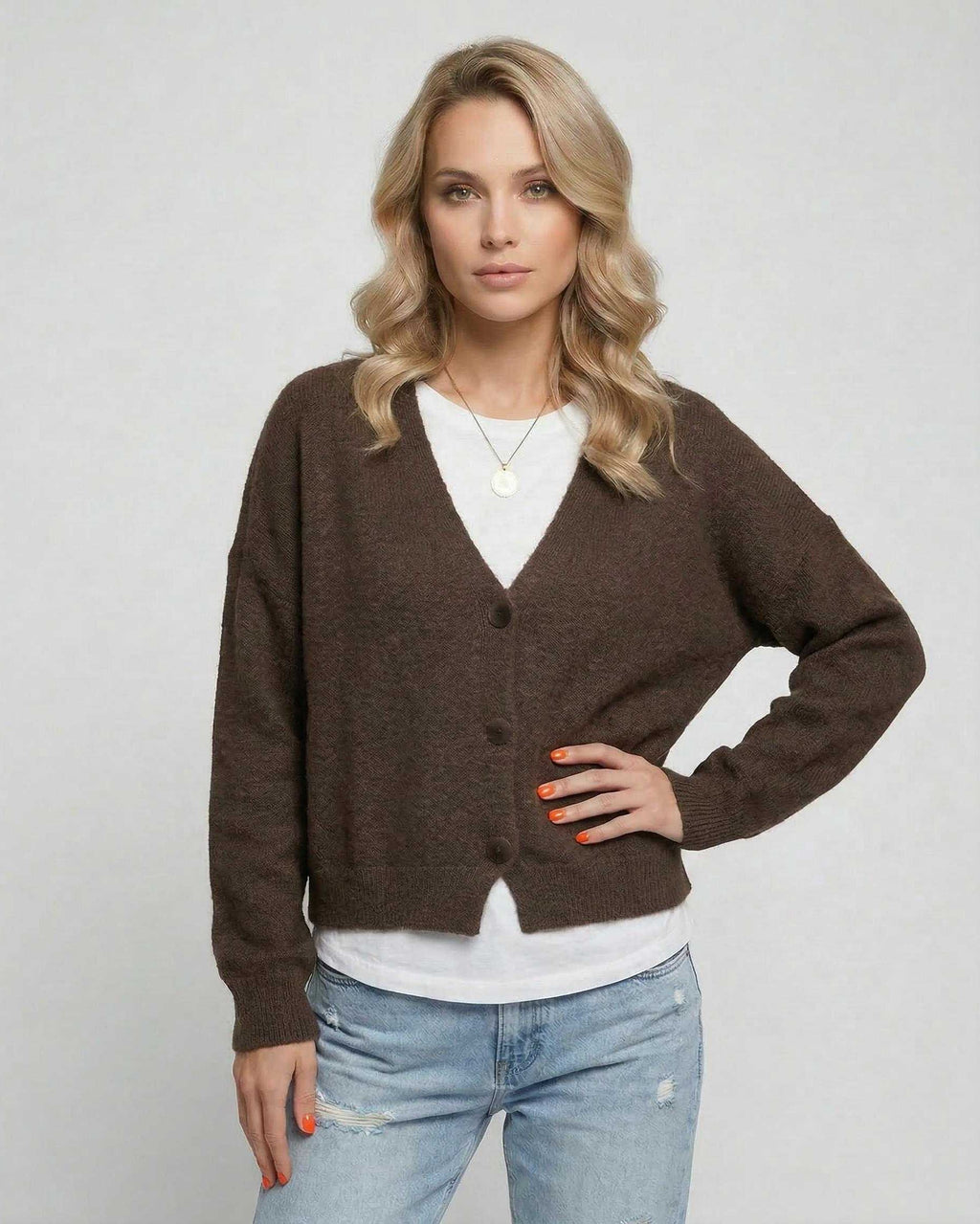 Terra Cardigan by Lauven, elegant brown knitwear model wearing relaxed fit cardigan for everyday style.